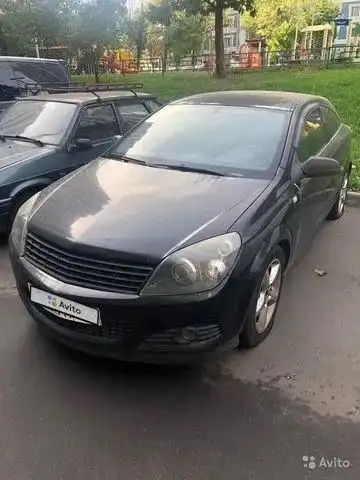 Фото автомобиля OPEL ASTRA, 2007 — госномер Т301РУ799. Цвет: ЧЕРНЫЙ