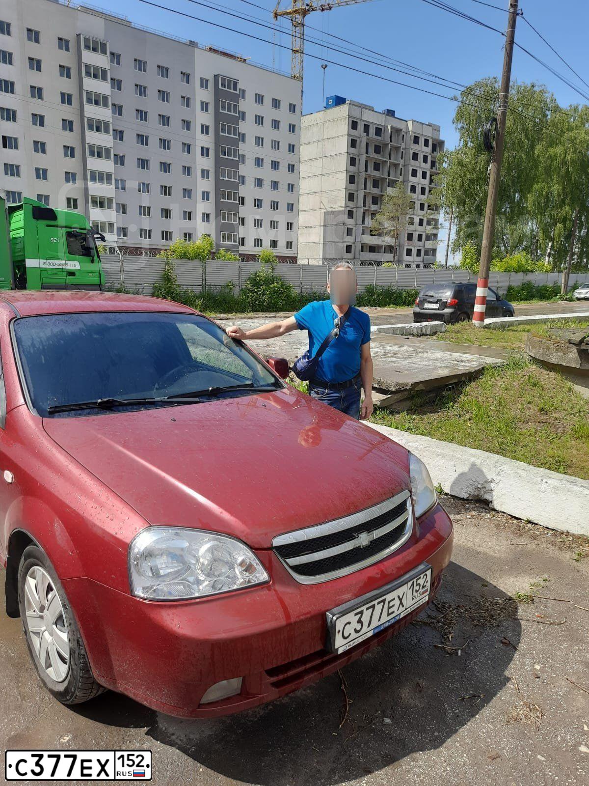 Фото автомобиля CHEVROLET LACETTI, 2012 — госномер С377ЕХ152. Цвет: Красный