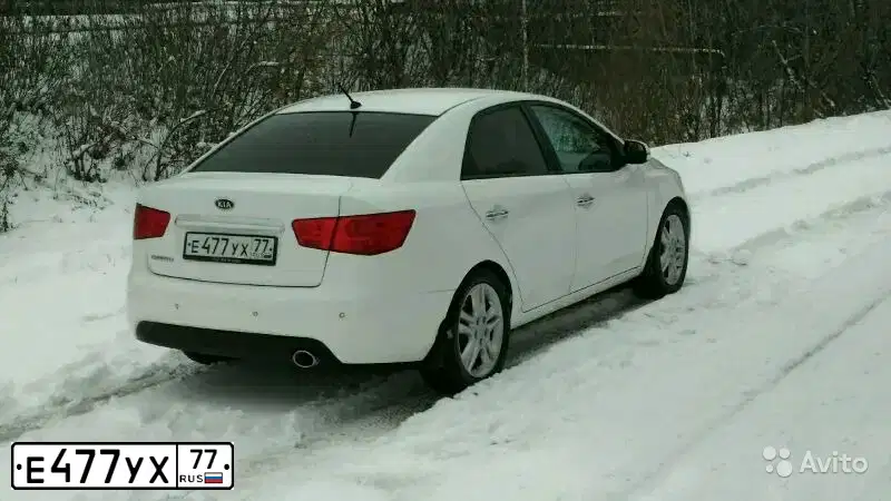 Фото автомобиля KIA CERATO, 2010 — госномер М956НВ73. Цвет: Белый
