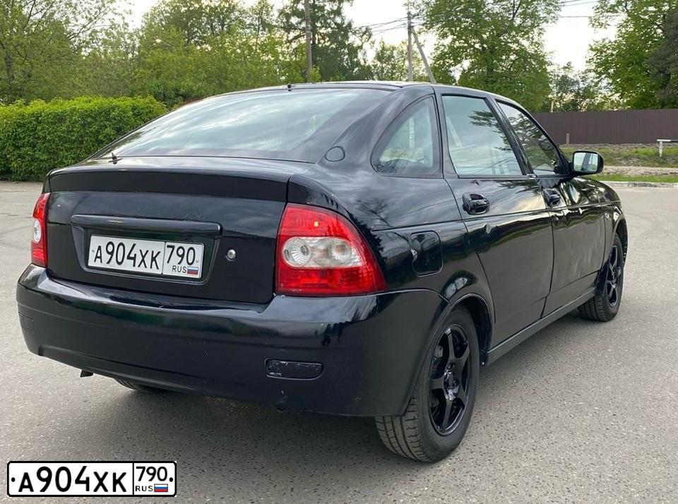 Фото автомобиля LADA PRIORA, 2011 — госномер У882КМ31. Цвет: Сине-Черный