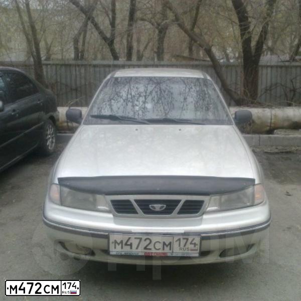 Фото автомобиля DAEWOO O NEXIA, 2007 — госномер М472СМ174. Цвет: ПЕРЛАМУТРОВО-СЕРЕБРИСТЫЙ