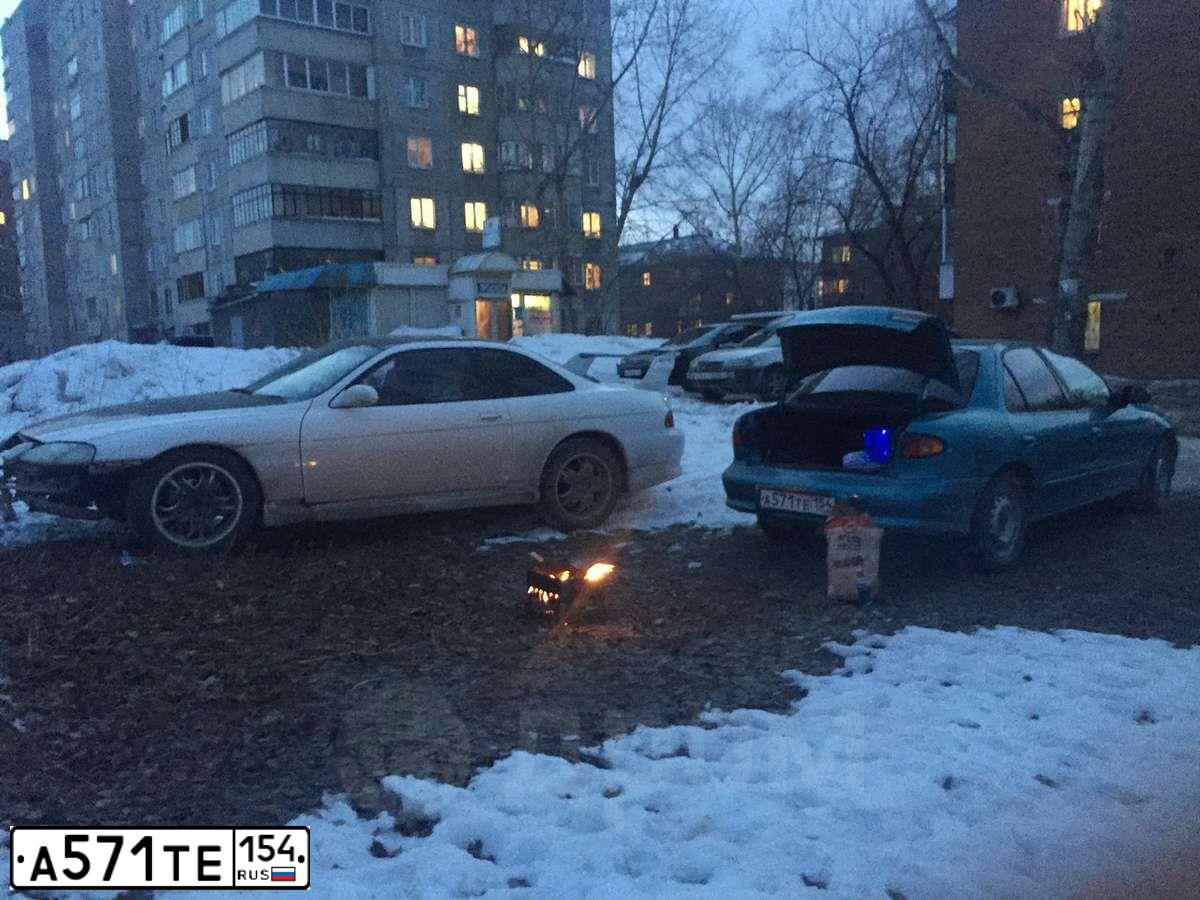 Фото автомобиля TOYOTA CAVALIER, 1999 — госномер Е132ОР54. Цвет: СИНИЙ