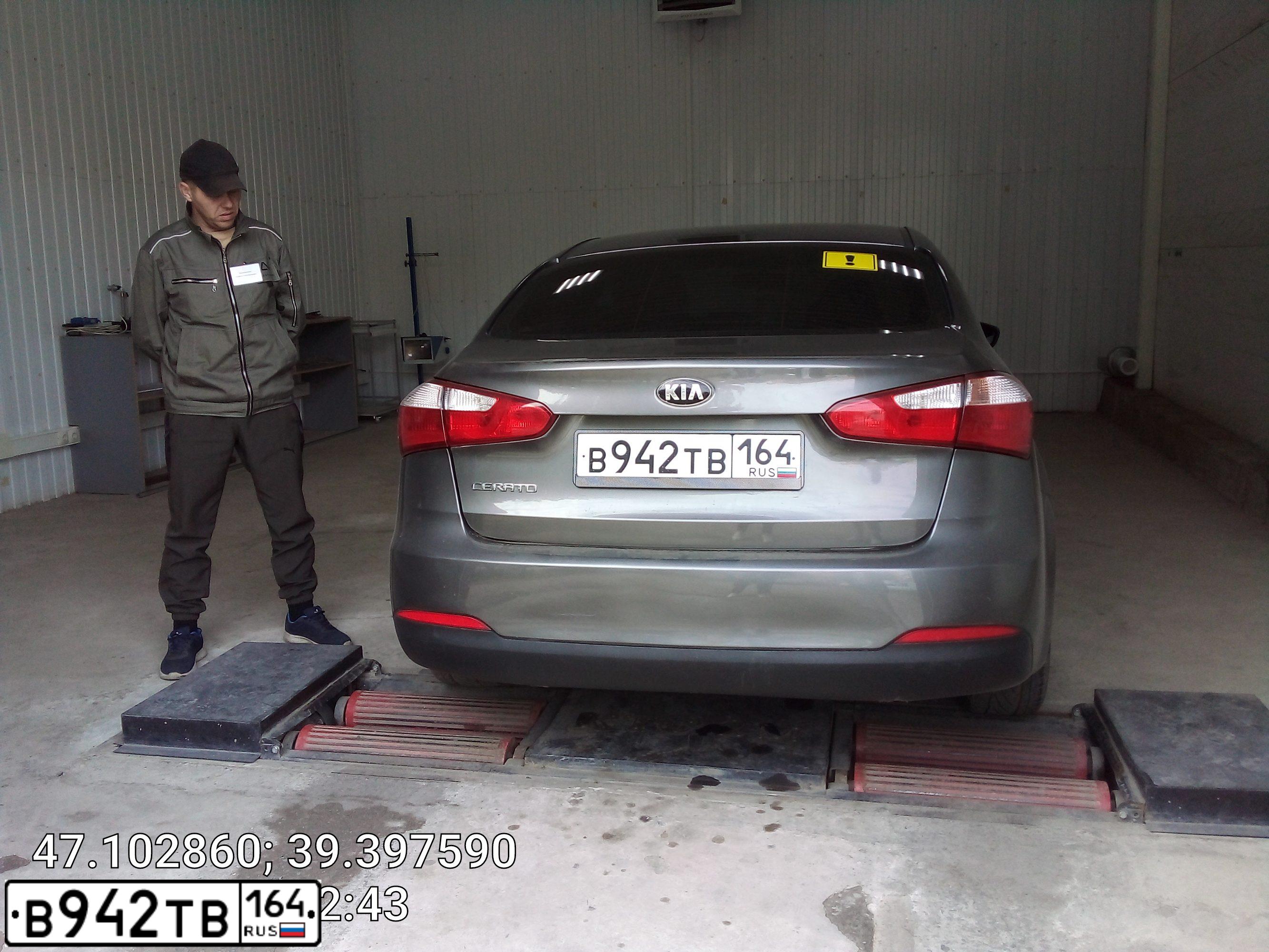 Фото автомобиля KIA CERATO, 2013 — госномер В445ЕР774. Цвет: СЕРЫЙ