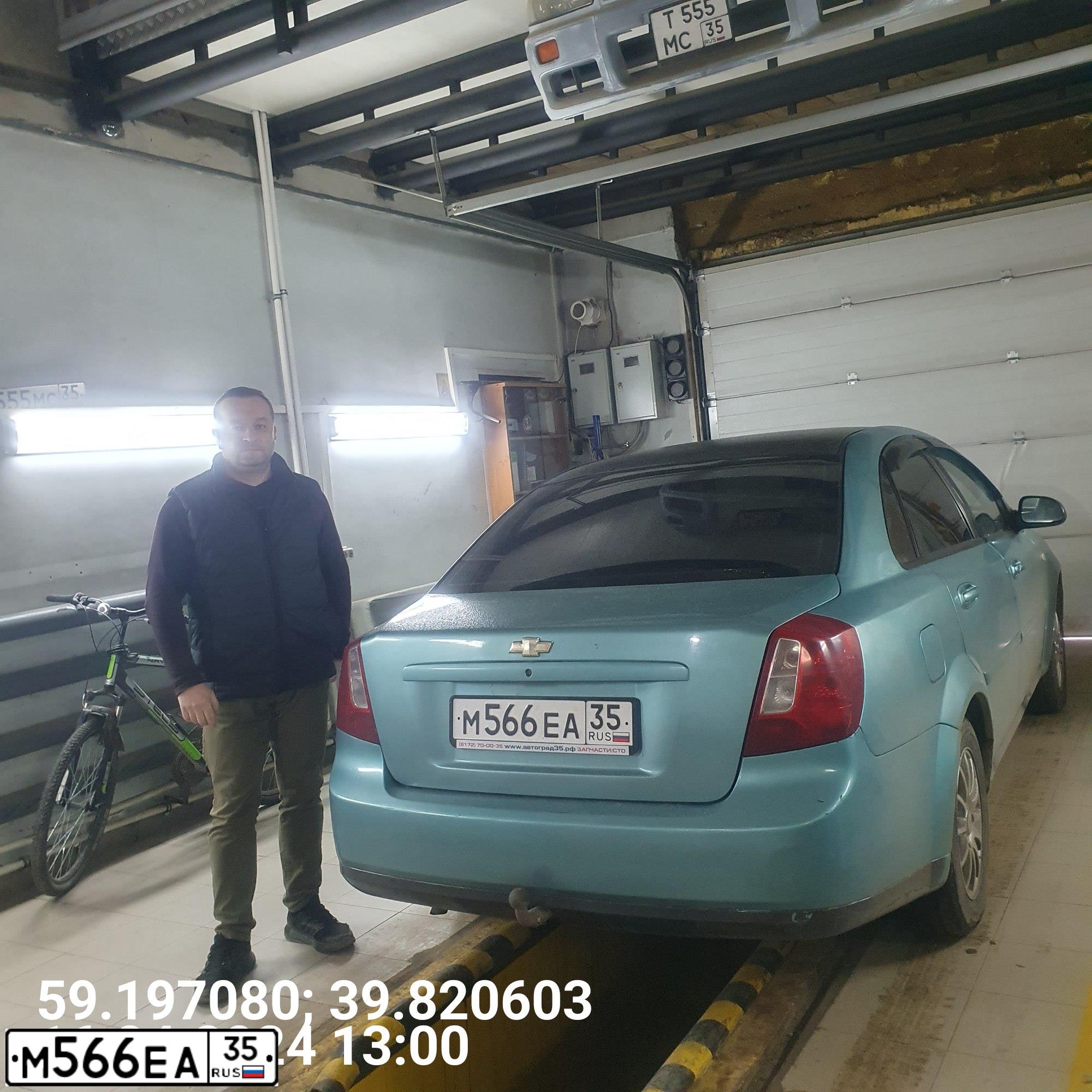 Фото автомобиля CHEVROLET LACETTI, 2007 — госномер М566ЕА35. Цвет: ЗЕЛЕНЫЙ ЧЕРНЫЙ