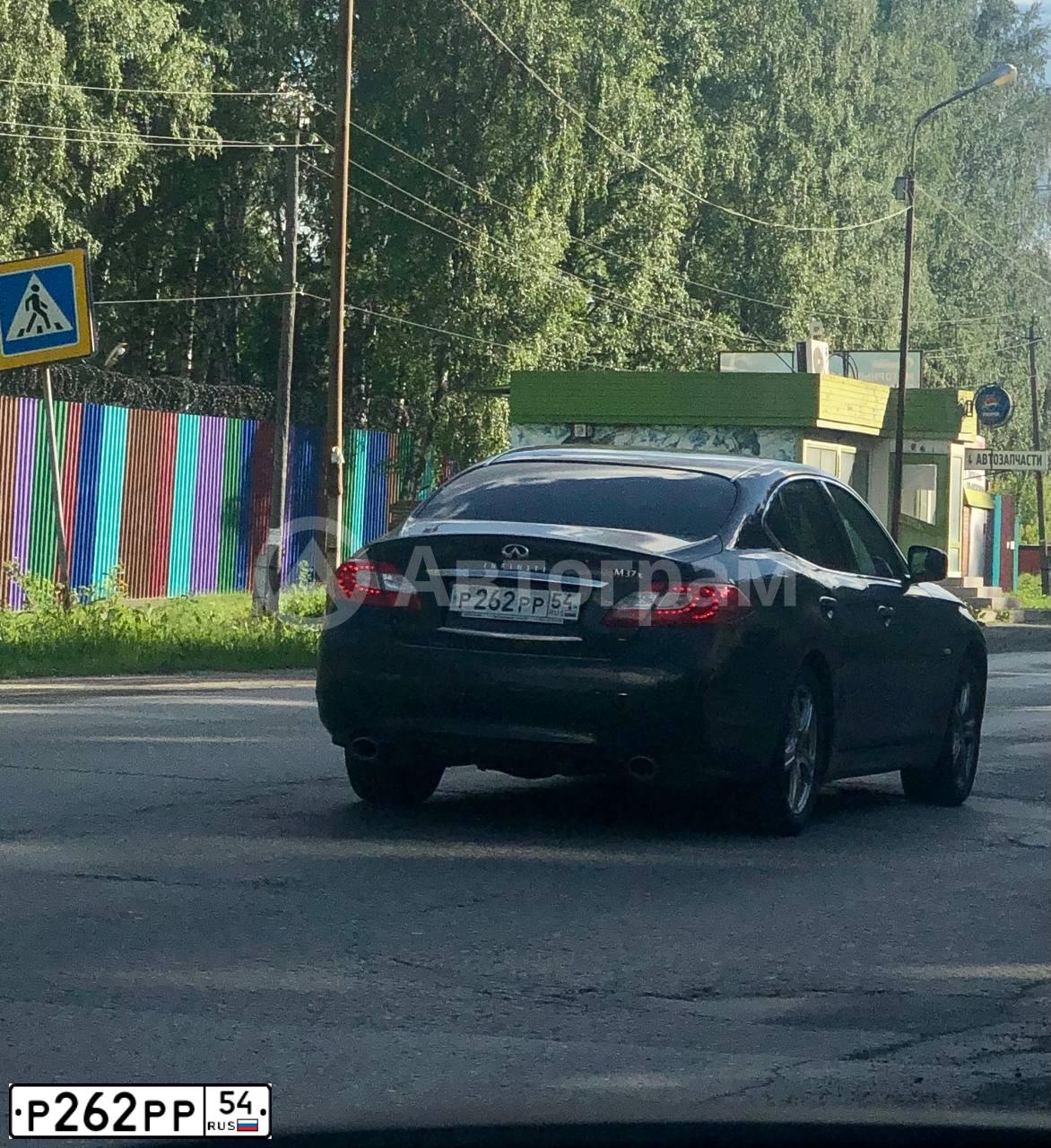 Фото автомобиля FORD FOCUS, 2012 — госномер Н302КУ154. Цвет: желто-оранжевый