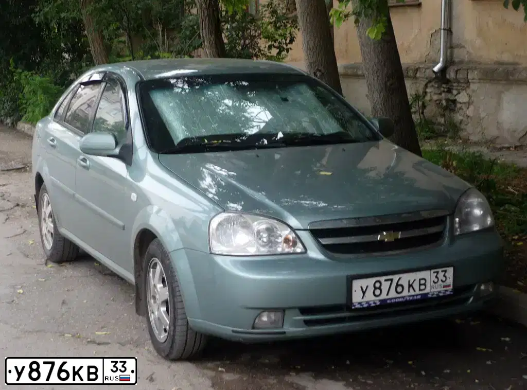 Фото автомобиля CHEVROLET LACETTI, 2006 — госномер У876КВ33. Цвет: ЗЕЛЕНЫЙ