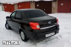 Фото автомобиля DATSUN ON-DO, 2015 — госномер Е048УО702. Цвет: Коричневый
