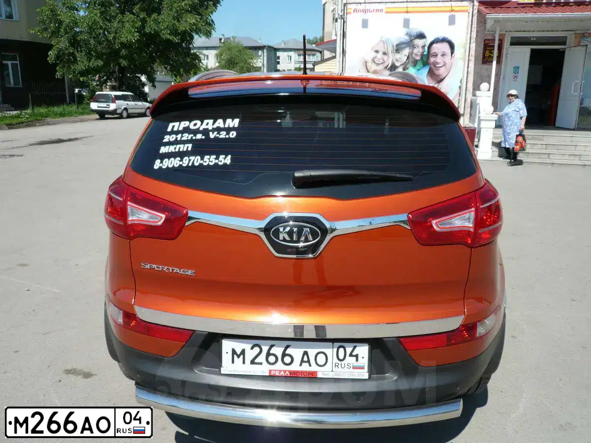 Фото автомобиля KIA SPORTAGE, 2012 — госномер В753ХК22. Цвет: ОРАНЖЕВЫЙ