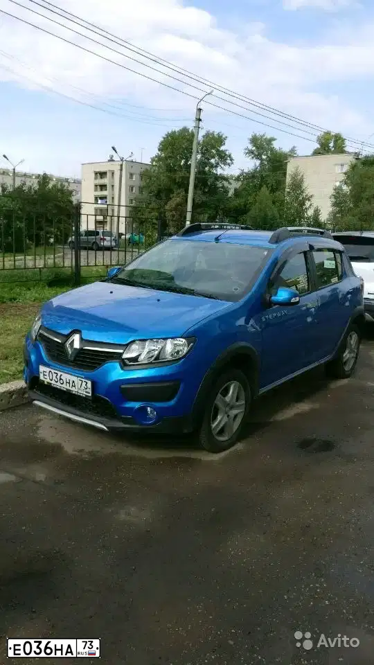 Фото автомобиля RENAULT SANDERO, 2015 — госномер Е036НА73. Цвет: СВЕТЛО-СИНИЙ
