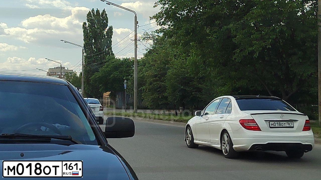 Фото автомобиля NISSAN TIIDA, 2011 — госномер М078ОТ161. Цвет: Белый