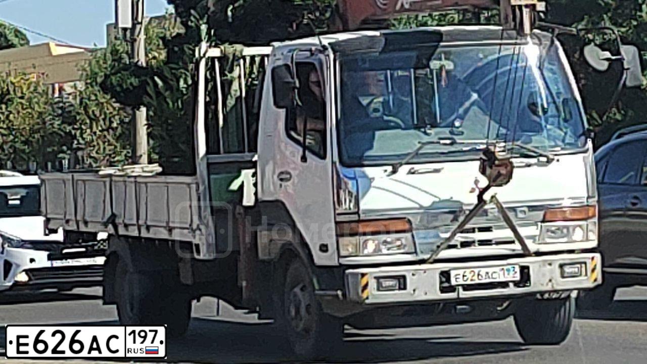 Фото автомобиля TOYOTA HIGHLANDER, 2003 — госномер Е626АС197. Цвет: ЧЕРНЫЙ