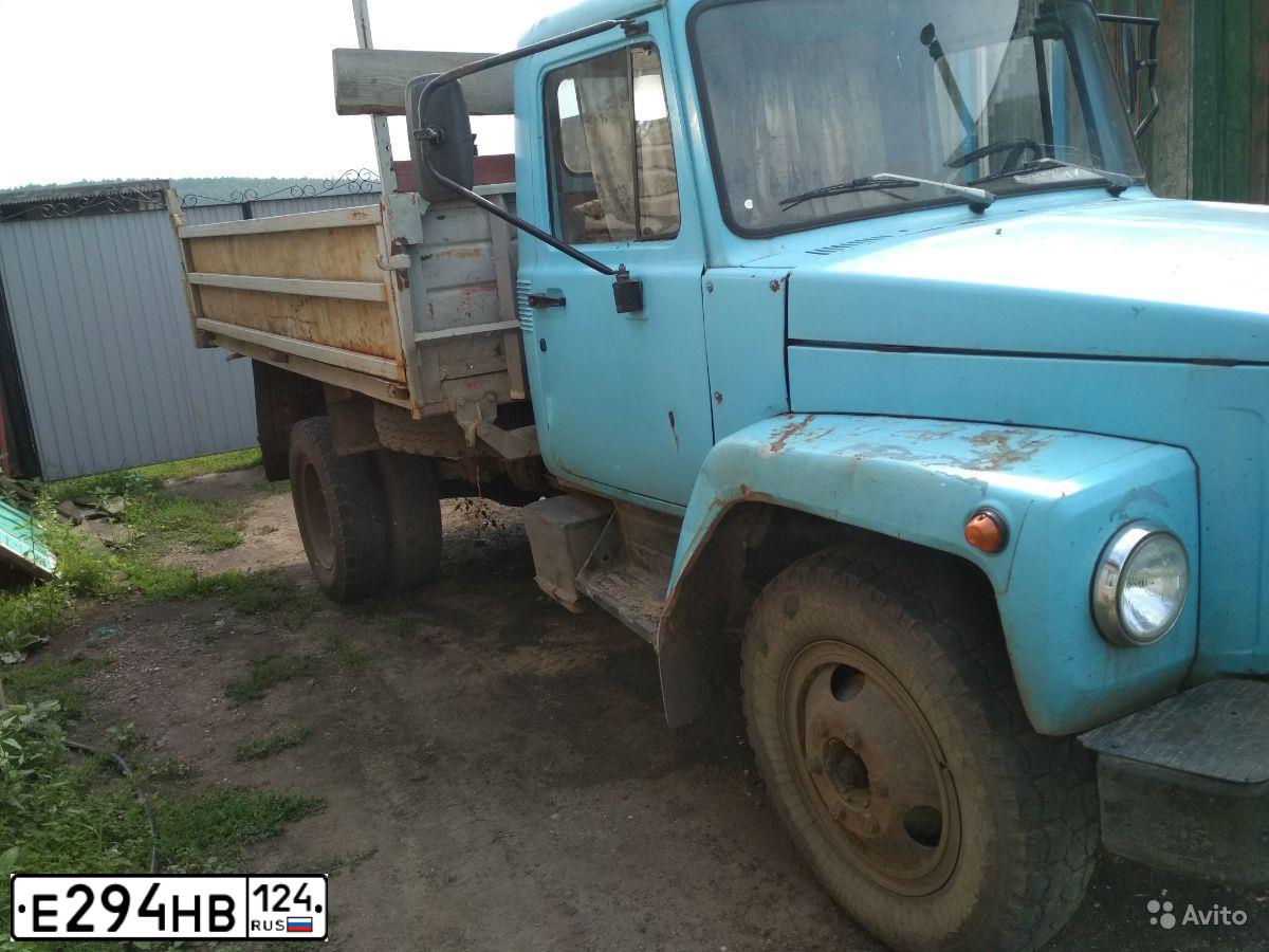 Фото автомобиля GAZ 3307, 1993 — госномер Е294НВ124. Цвет: синий