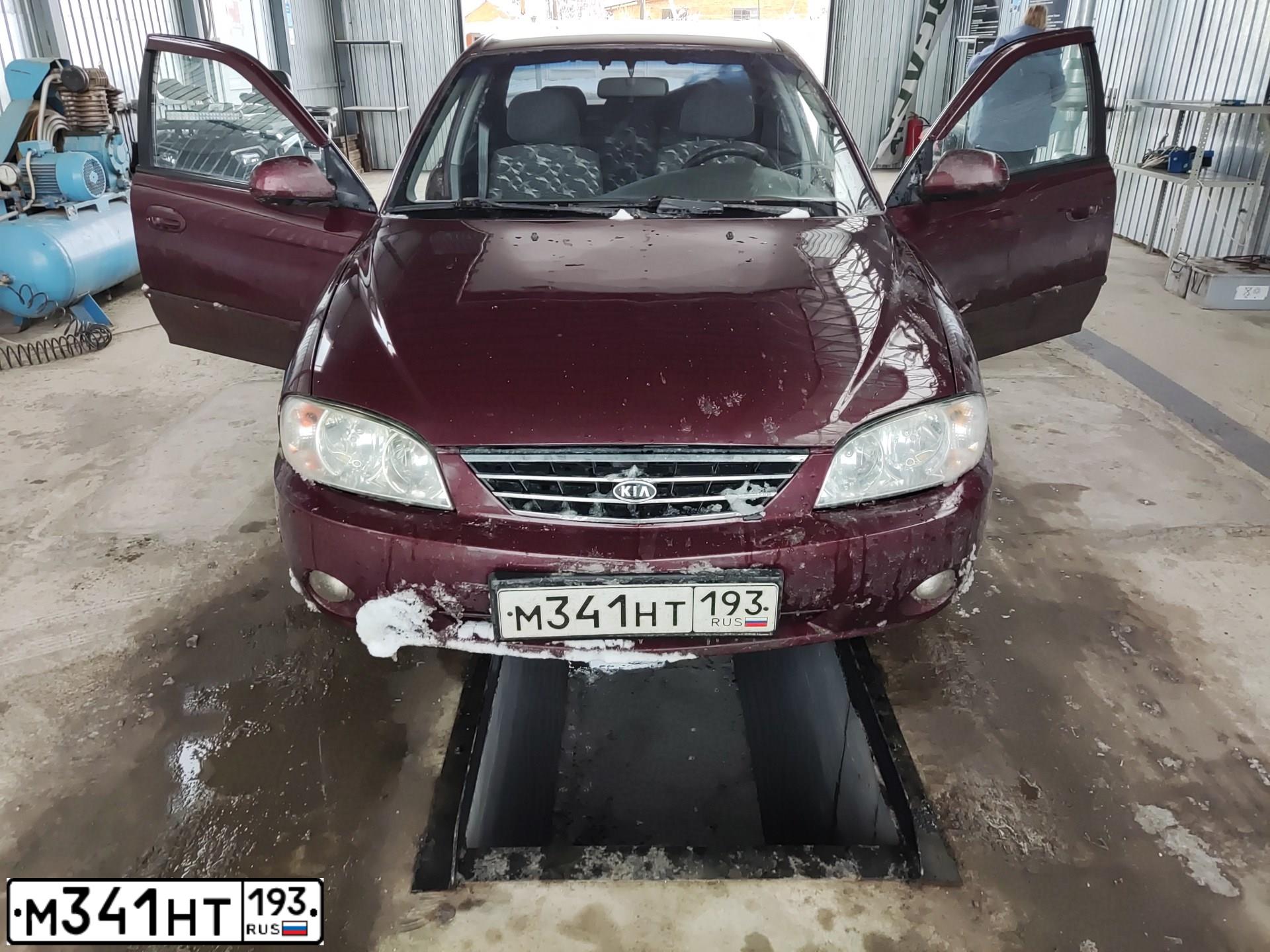 Фото автомобиля KIA SPECTRA, 2007 — госномер Е664УХ150. Цвет: Красный