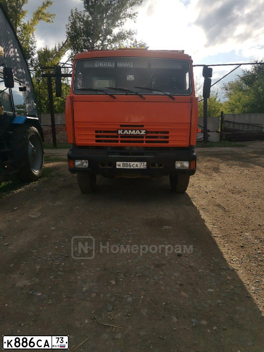 Фото автомобиля KAMAZ Z 65115 6X4, 2009 — госномер Е909ВО123. Цвет: ОРАНЖЕВЫЙ