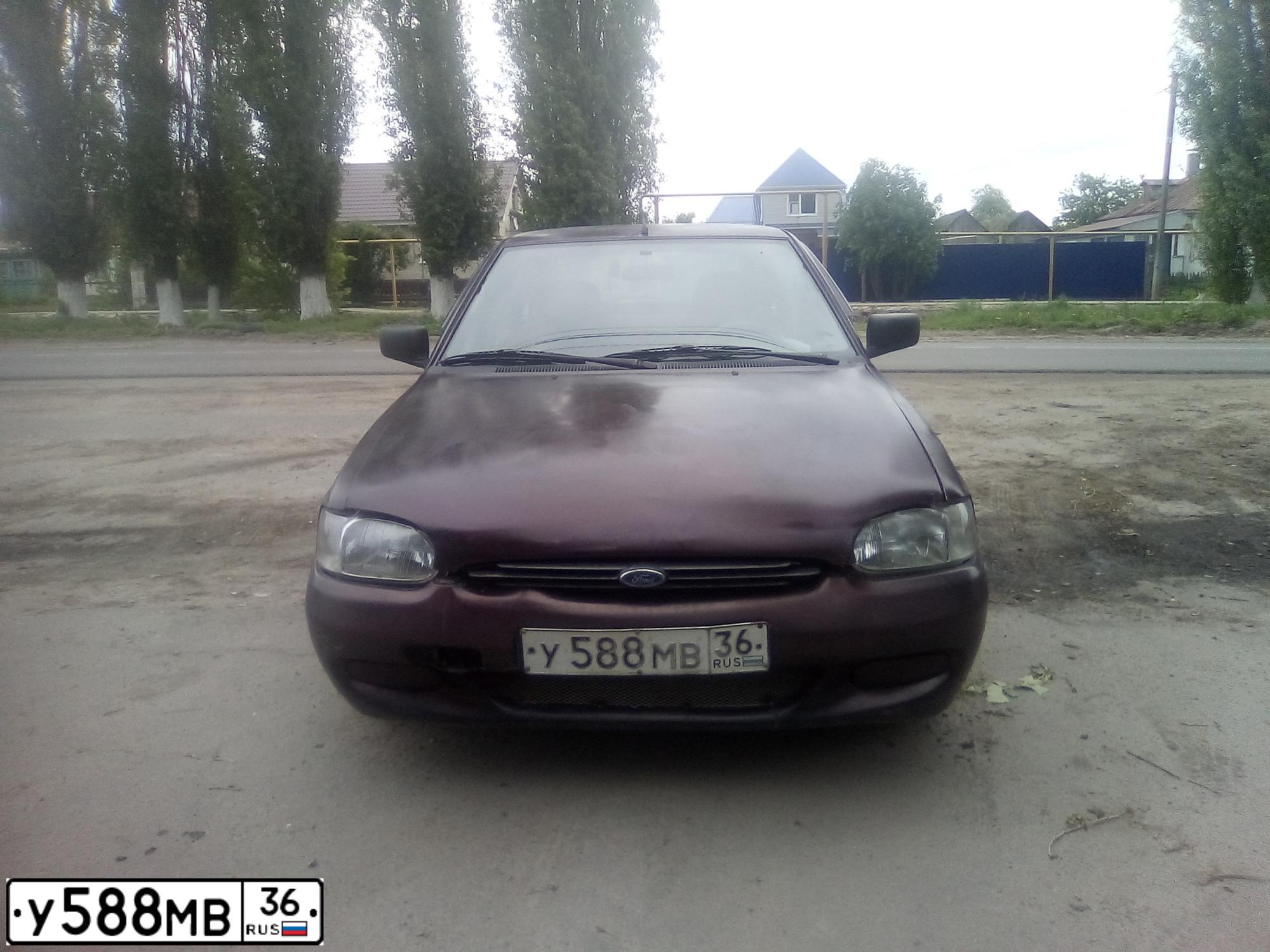 Фото автомобиля FORD ESCORT, 1997 — госномер У588МВ36. Цвет: КОРИЧНЕВЫЙ
