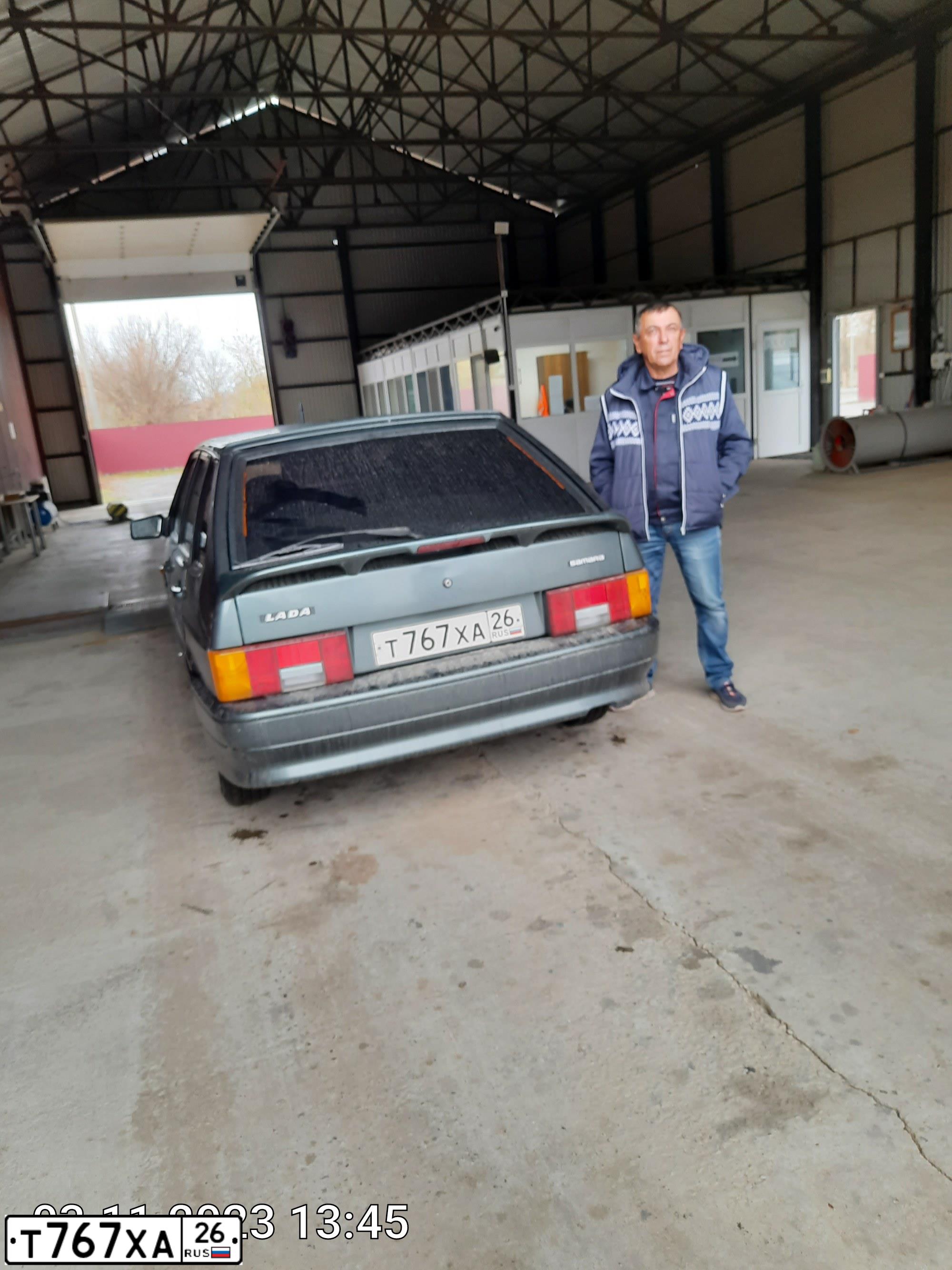 Фото автомобиля LADA 2114 SAMARA, 2008 — госномер Т767ХА26. Цвет: СЕРО-СИНИЙ-ЗЕЛЕНЫЙ