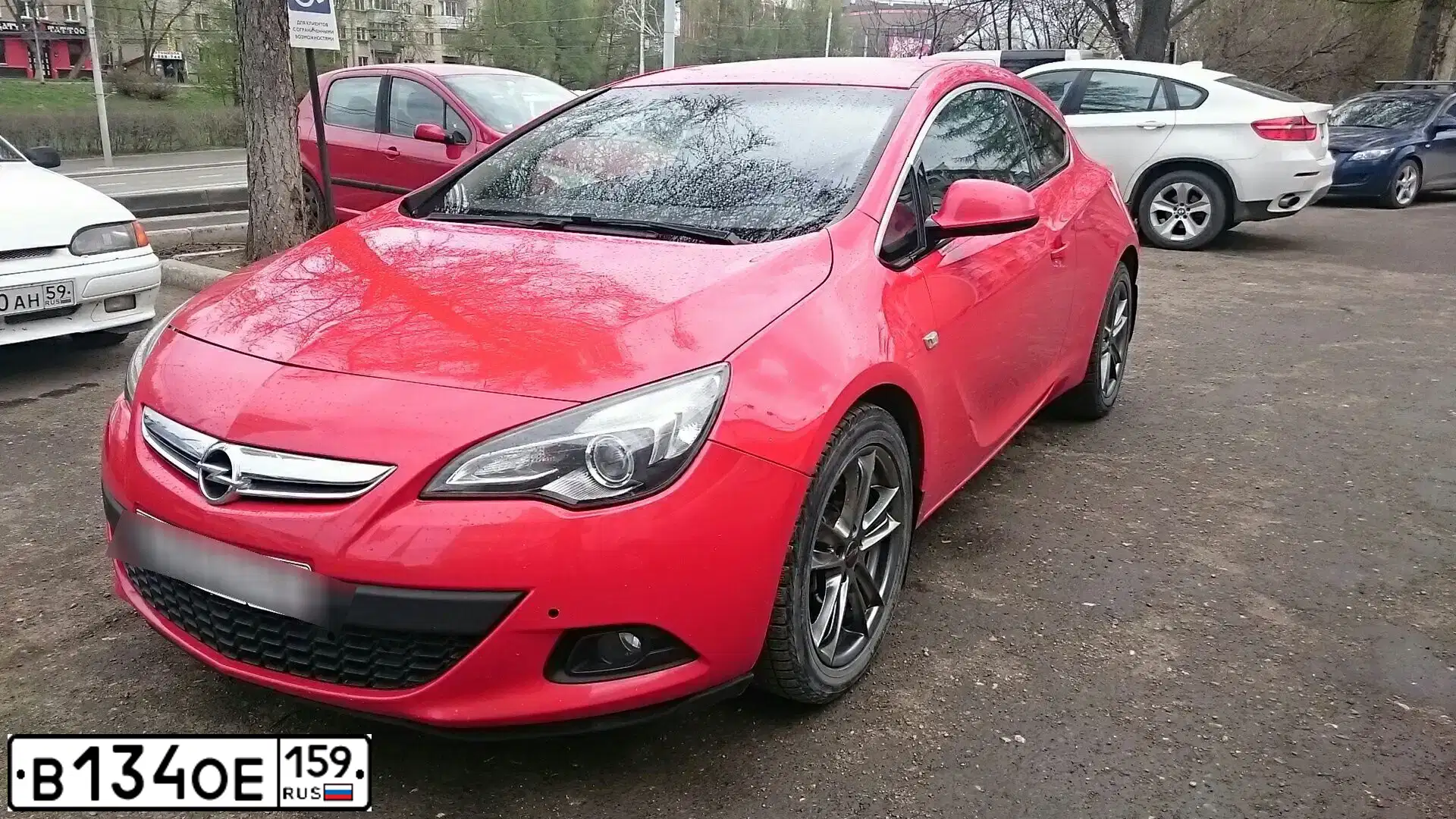 Фото автомобиля OPEL ASTRA, 2012 — госномер С705ВЕ774