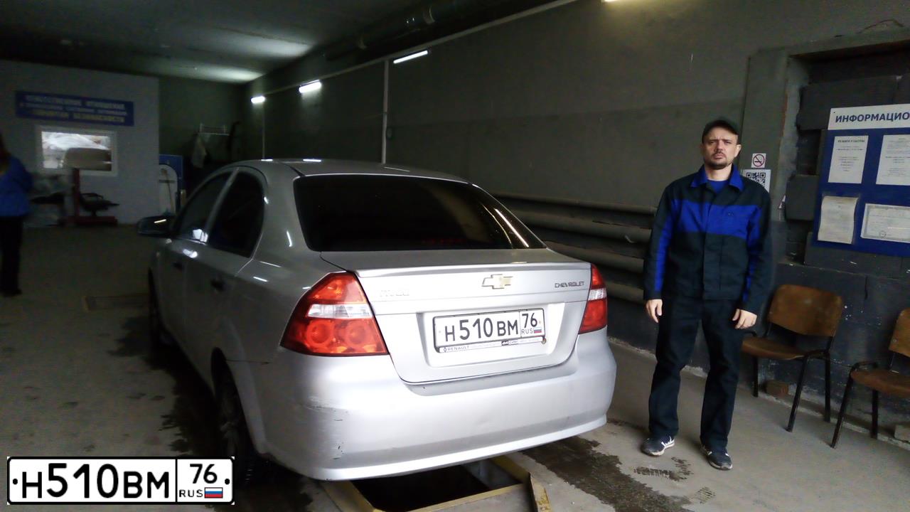 Фото автомобиля ШЕВРОЛЕ АВЕО, 2008 — госномер Р201ЕХ76. Цвет: СВЕТЛО-СЕРЫЙ