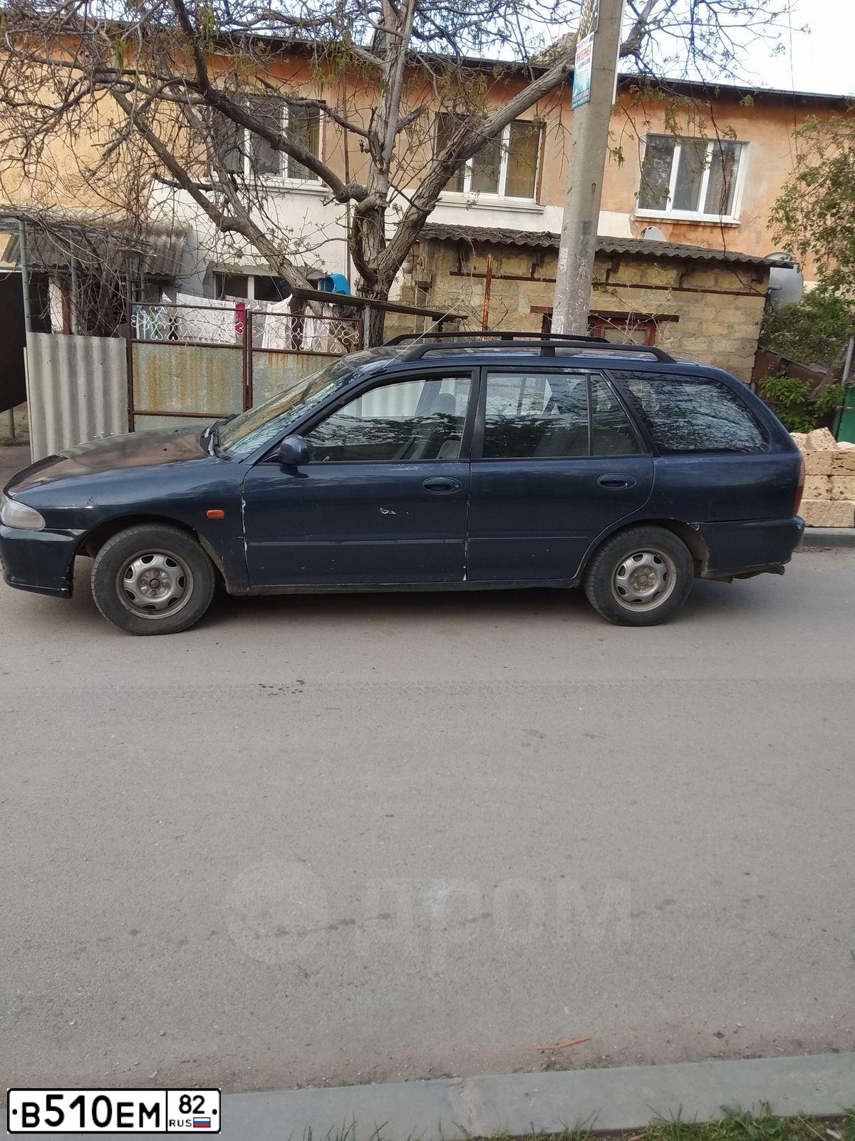 Фото автомобиля МИЦУБИСИ ЛАНСЕР, 1994 — госномер В510ЕМ82. Цвет: синий