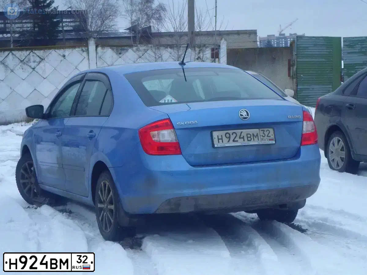 Фото автомобиля SKODA RAPID, 2015 — госномер Н924ВМ32. Цвет: СИНИЙ