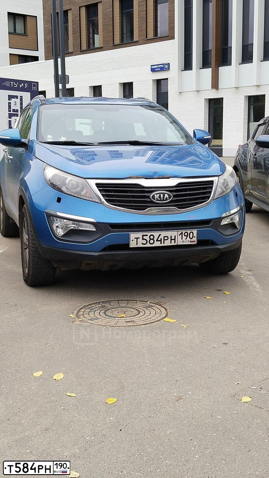 Фото автомобиля KIA SPORTAGE, 2012 — госномер Т584РН190. Цвет: СИНИЙ