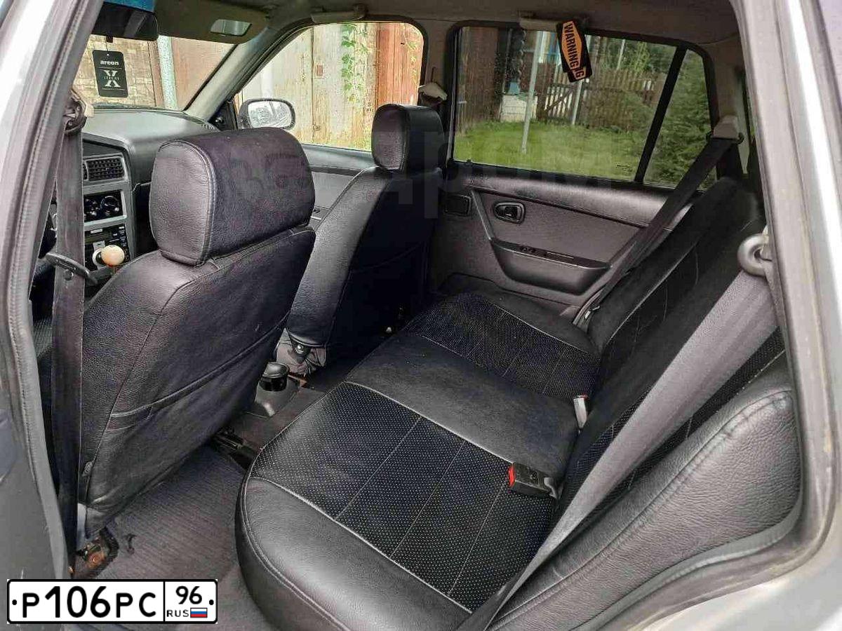 Фото автомобиля DAEWOO NEXIA, 2010 — госномер Р106РС96. Цвет: СВЕТЛО-СЕРЫЙ
