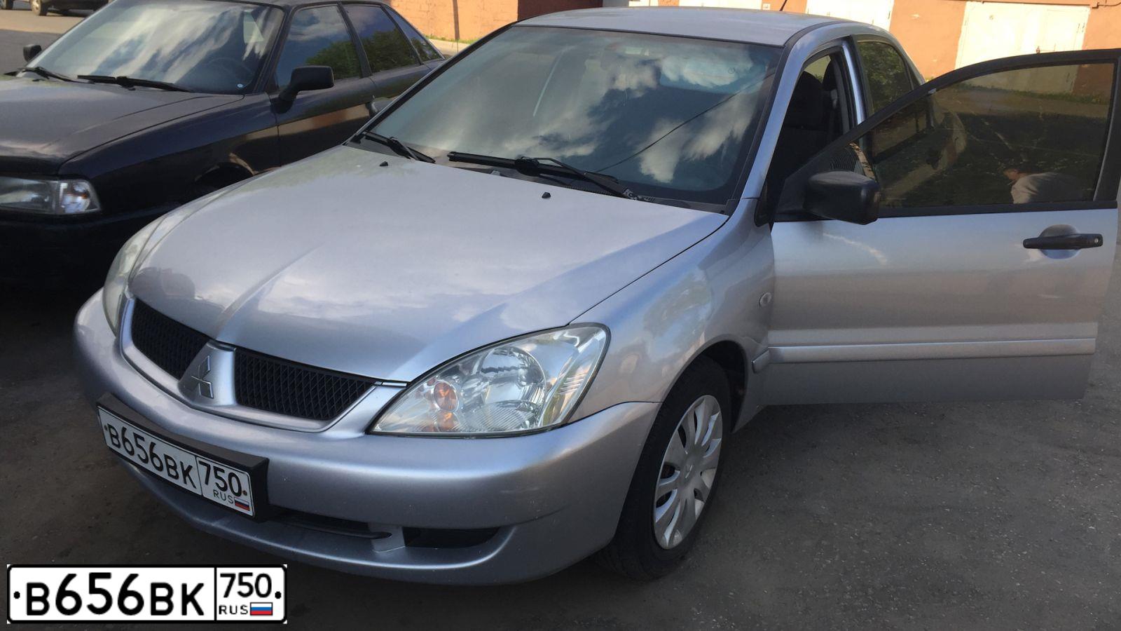 Фото автомобиля MITSUBISHI LANCER, 2005 — госномер А150ОУ147. Цвет: Серебристый