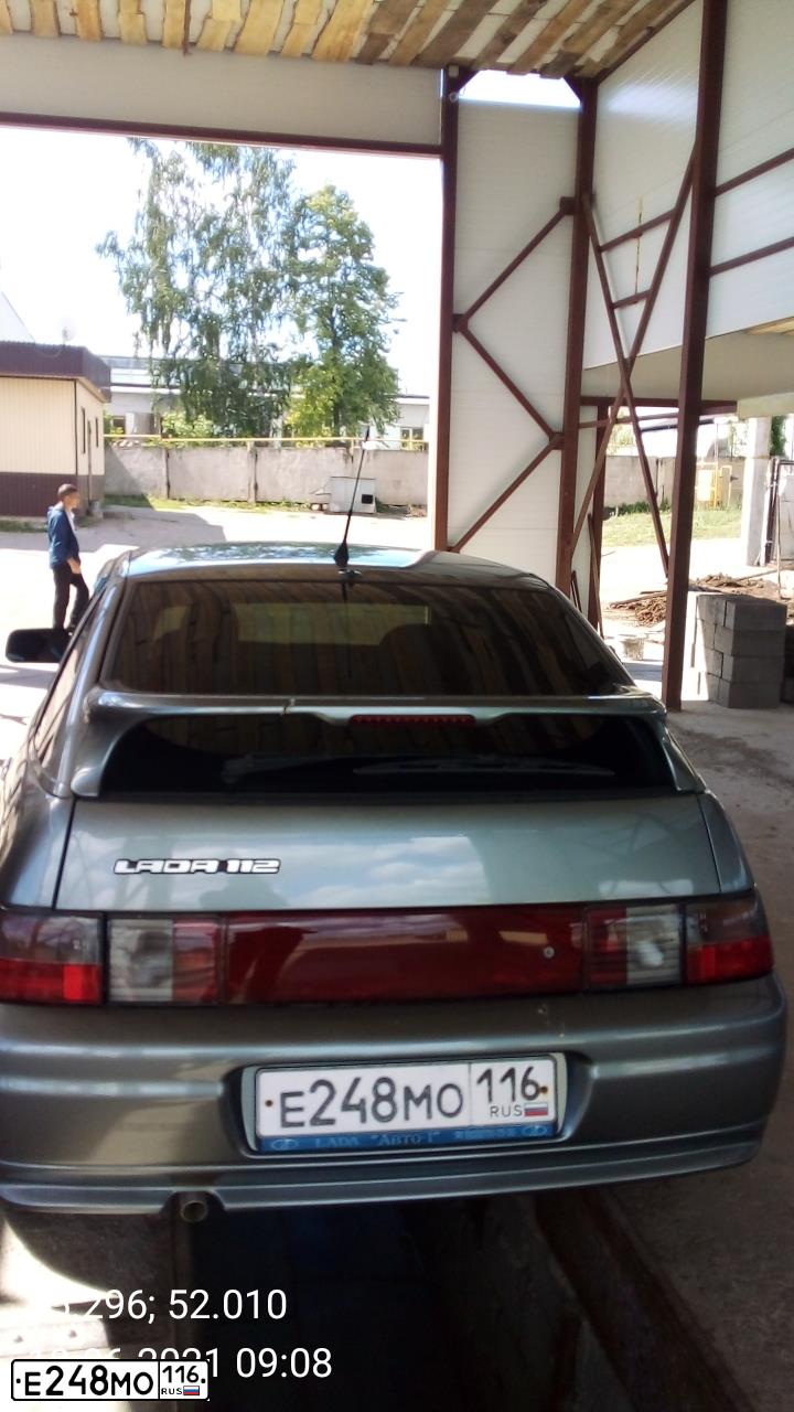 Фото автомобиля VAZ 2112 LADA, 2007 — госномер Е248МО116. Цвет: СРЕДНИЙ СЕРО-ЗЕЛЕНЫЙ МЕТ