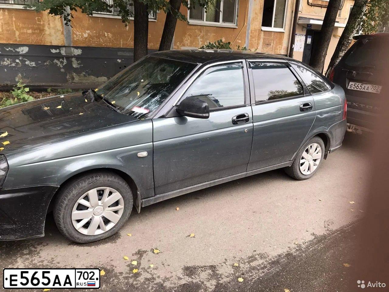 Фото автомобиля SSANGYONG REXTON, 2008 — госномер Е565АА702. Цвет: ЧЕРНЫЙ МЕТАЛЛИК