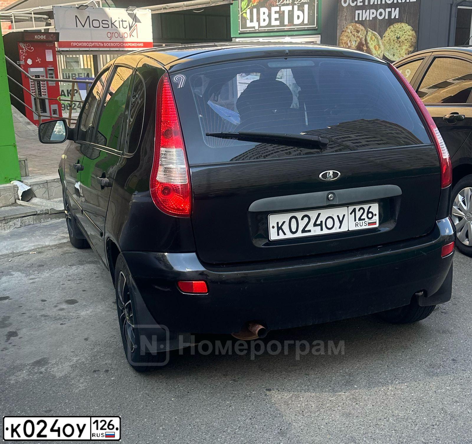Фото автомобиля LADA 1119 KALINA, 2010 — госномер К024ОУ126. Цвет: Сине-Черный