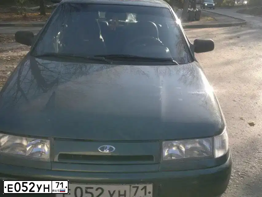 Фото автомобиля LADA 2110, 2006 — госномер Е052УН71. Цвет: Серо-сине-зеленый