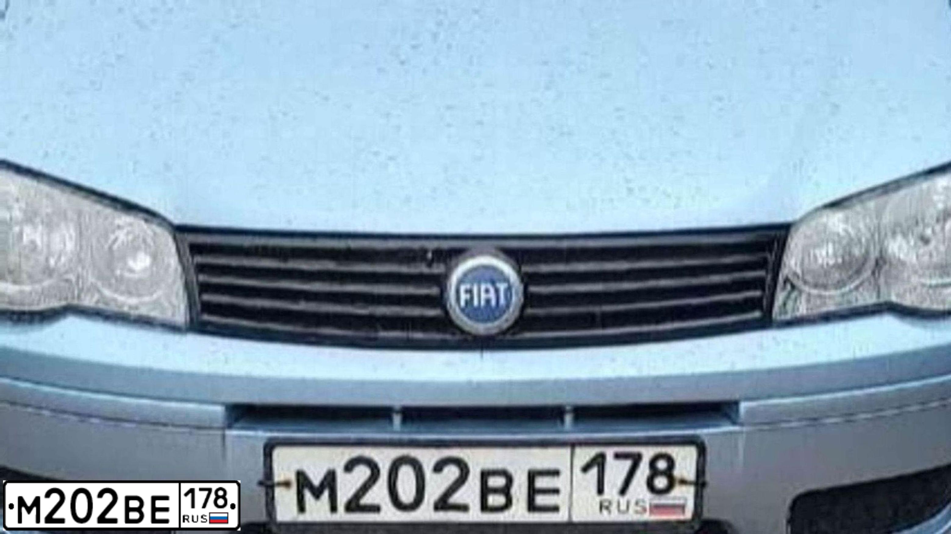 Фото автомобиля FIAT ALBEA, 2007 — госномер О301НМ29. Цвет: голубой