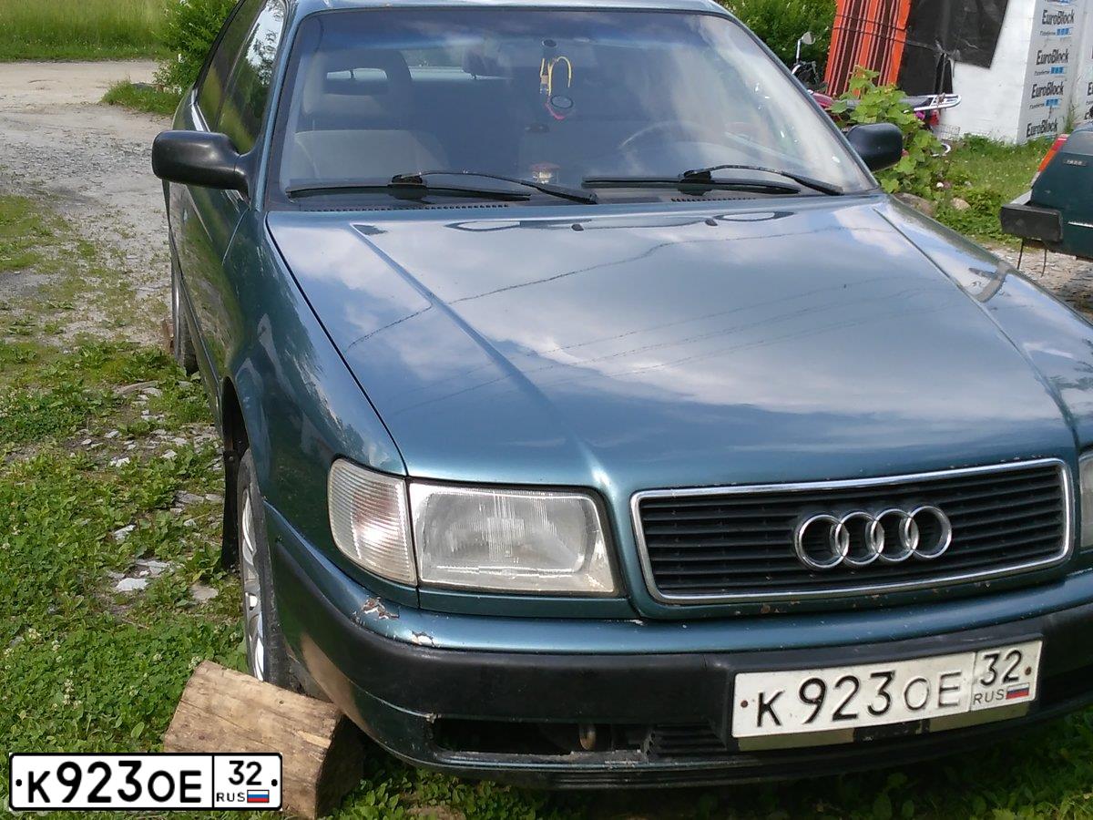 Фото автомобиля AUDI 100, 1992 — госномер О131УС31. Цвет: СИНИЙ