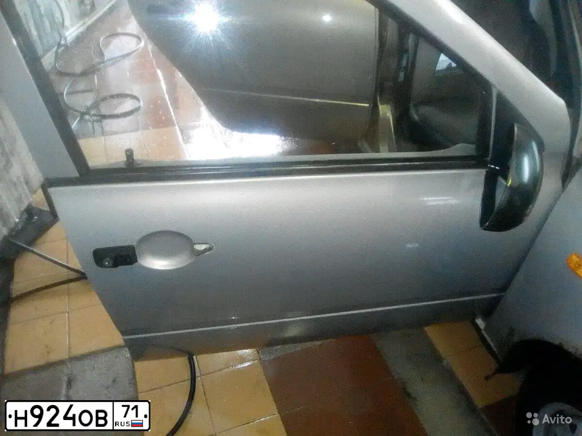 Фото автомобиля LADA 1118 KALINA, 2005 — госномер Н924ОВ71. Цвет: БЕЖЕВО-СЕРЫЙ