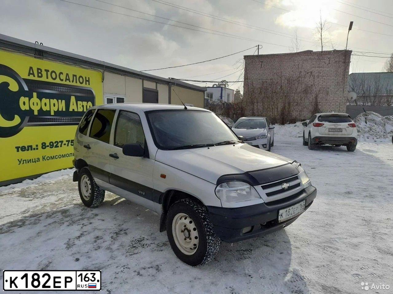 Фото автомобиля CHEVROLET NIVA, 2007 — госномер К182ЕР163. Цвет: СВЕТЛО-СЕРЕБРИСТЫЙ  МЕТАЛЛИК