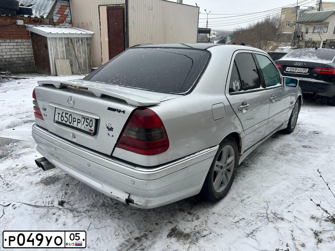 Фото автомобиля AUDI A6, 2010 — госномер Р049УО05. Цвет: ЧЕРНЫЙ