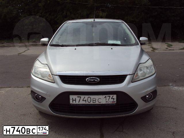Фото автомобиля FORD FOCUS, 2008 — госномер Н740ВС174. Цвет: СВЕТЛО СЕРЫЙ