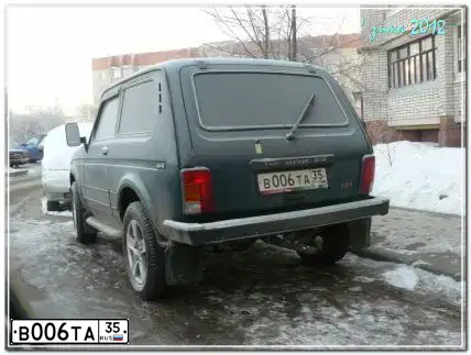 Фото автомобиля LADA 2121 NIVA, 2004 — госномер К380КВ35. Цвет: сине-зеленый