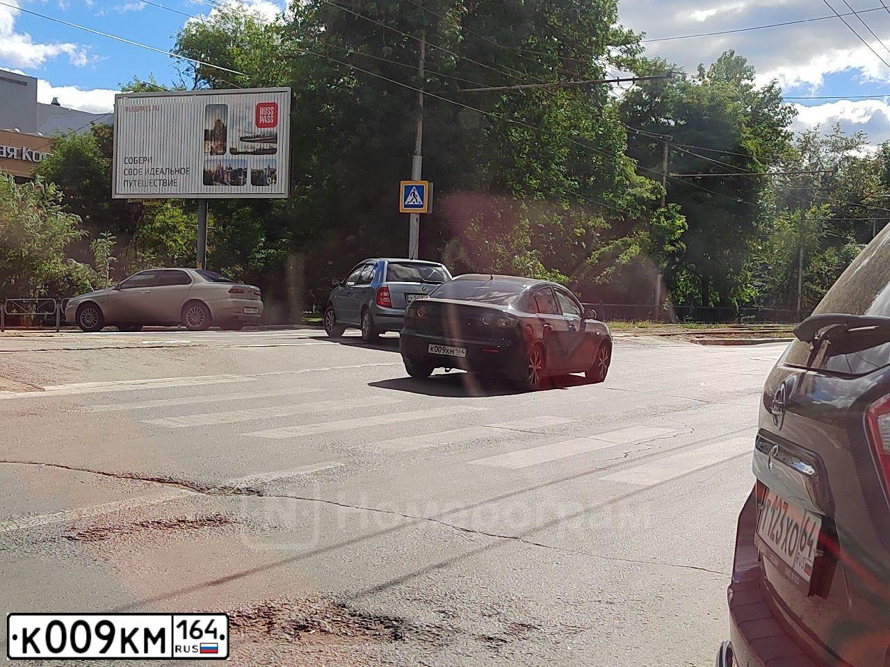 Фото автомобиля MAZDA 3, 2007 — госномер В228ОТ134. Цвет: ЧЕРНЫЙ