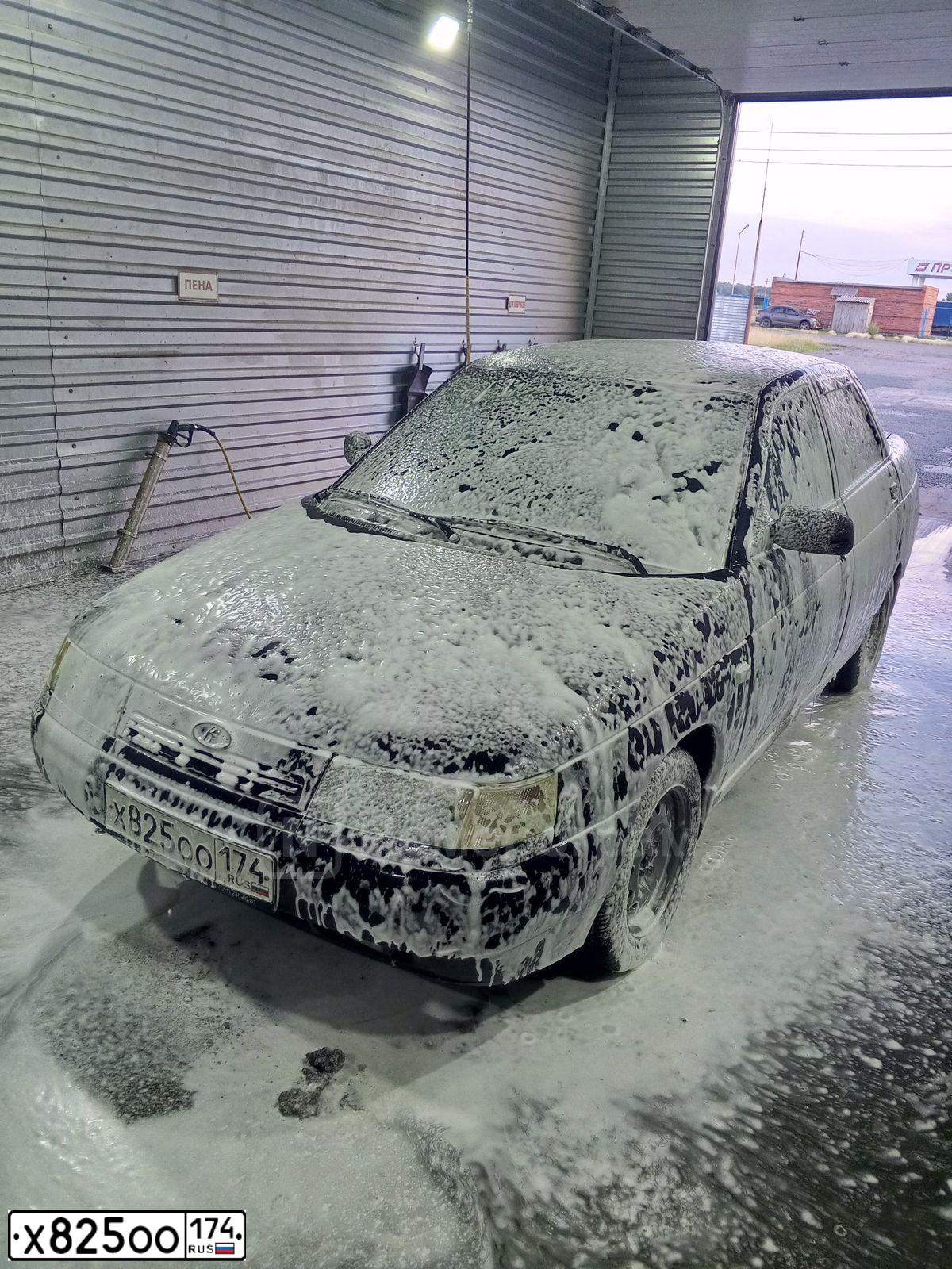 Фото автомобиля BOGDAN 2110/2111, 2011 — госномер Х825ОО174. Цвет: ЧЕРНЫЙ