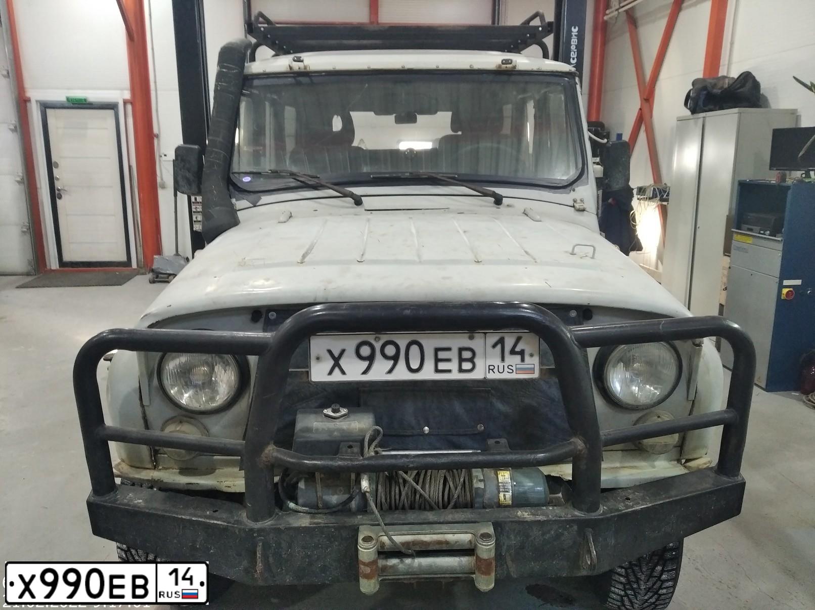 Фото автомобиля UAZ 3151 / HUNTER, 2002 — госномер Х990ЕВ14. Цвет: БЕЛАЯ НОЧЬ