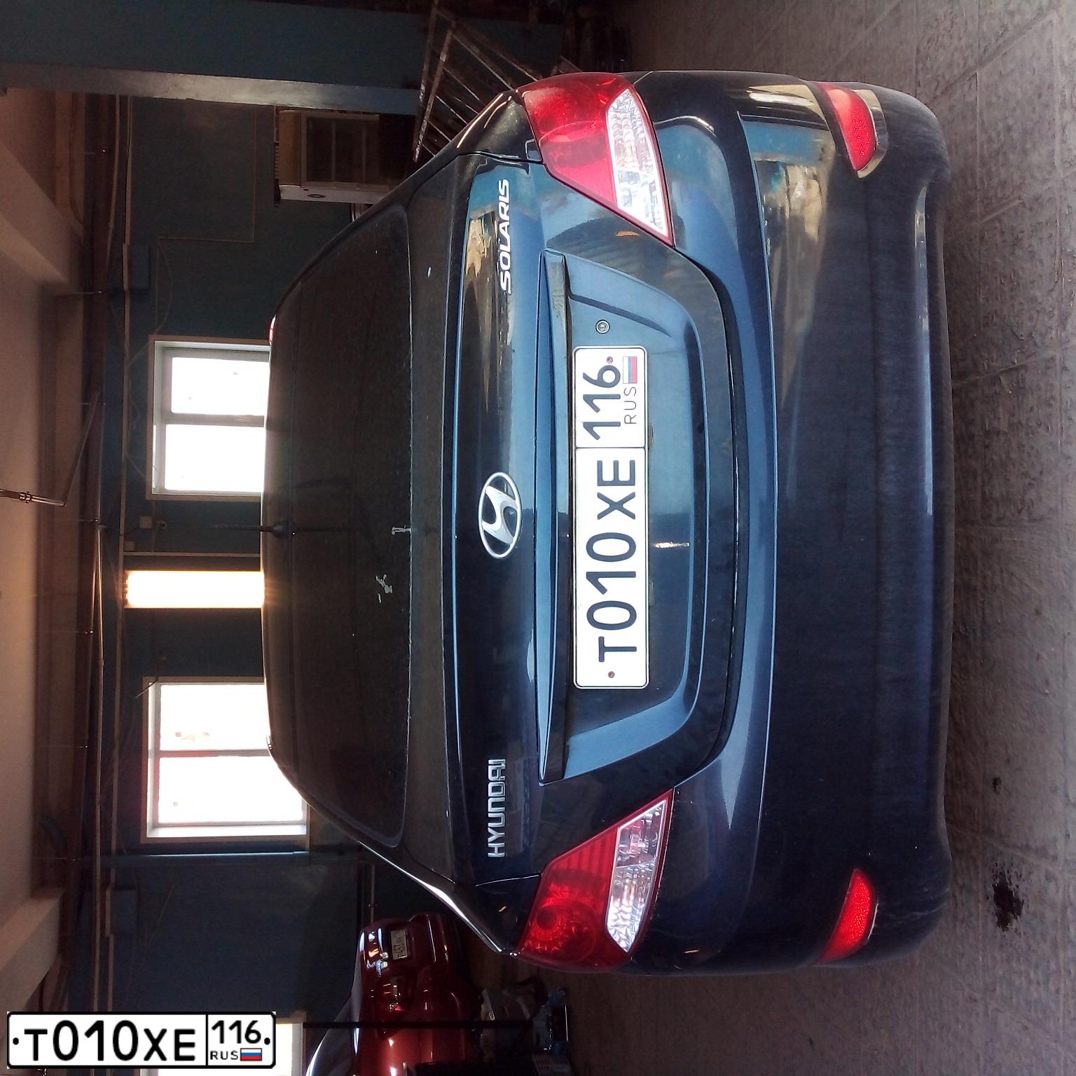 Фото автомобиля HYUNDAI SOLARIS, 2014 — госномер Т010ХЕ116. Цвет: ЧЕРНЫЙ