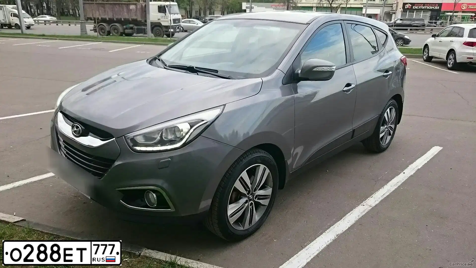 Фото автомобиля HYUNDAI IX35, 2014 — госномер С195НЕ30. Цвет: Серый
