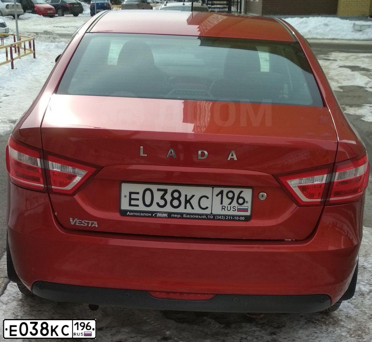 Фото автомобиля LADA VESTA, 2016 — госномер Е038КС196. Цвет: КРАСНЫЙ