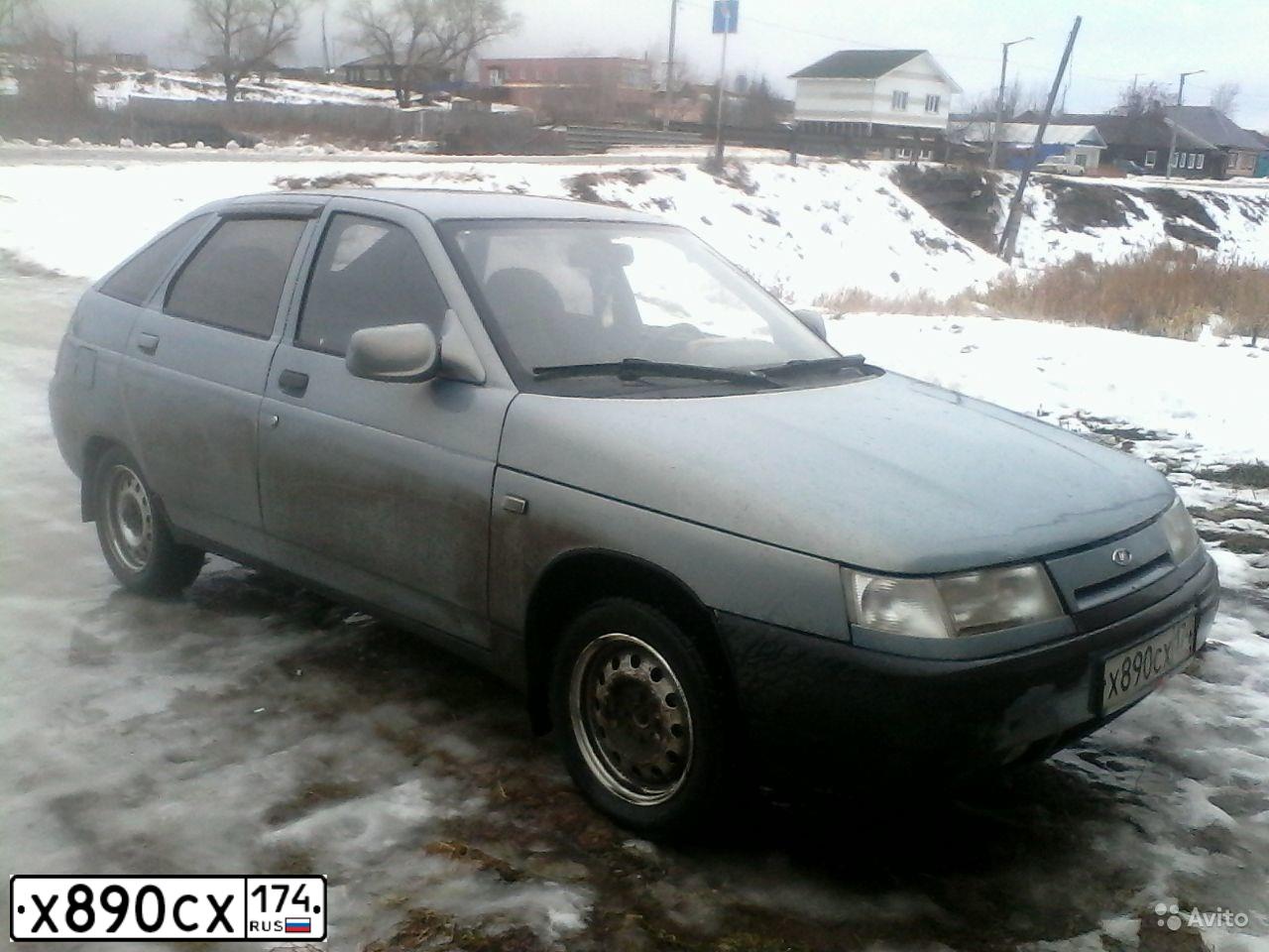 Фото автомобиля LADA 2112, 2002 — госномер Р144КН174. Цвет: ЖЕЛТЫЙ