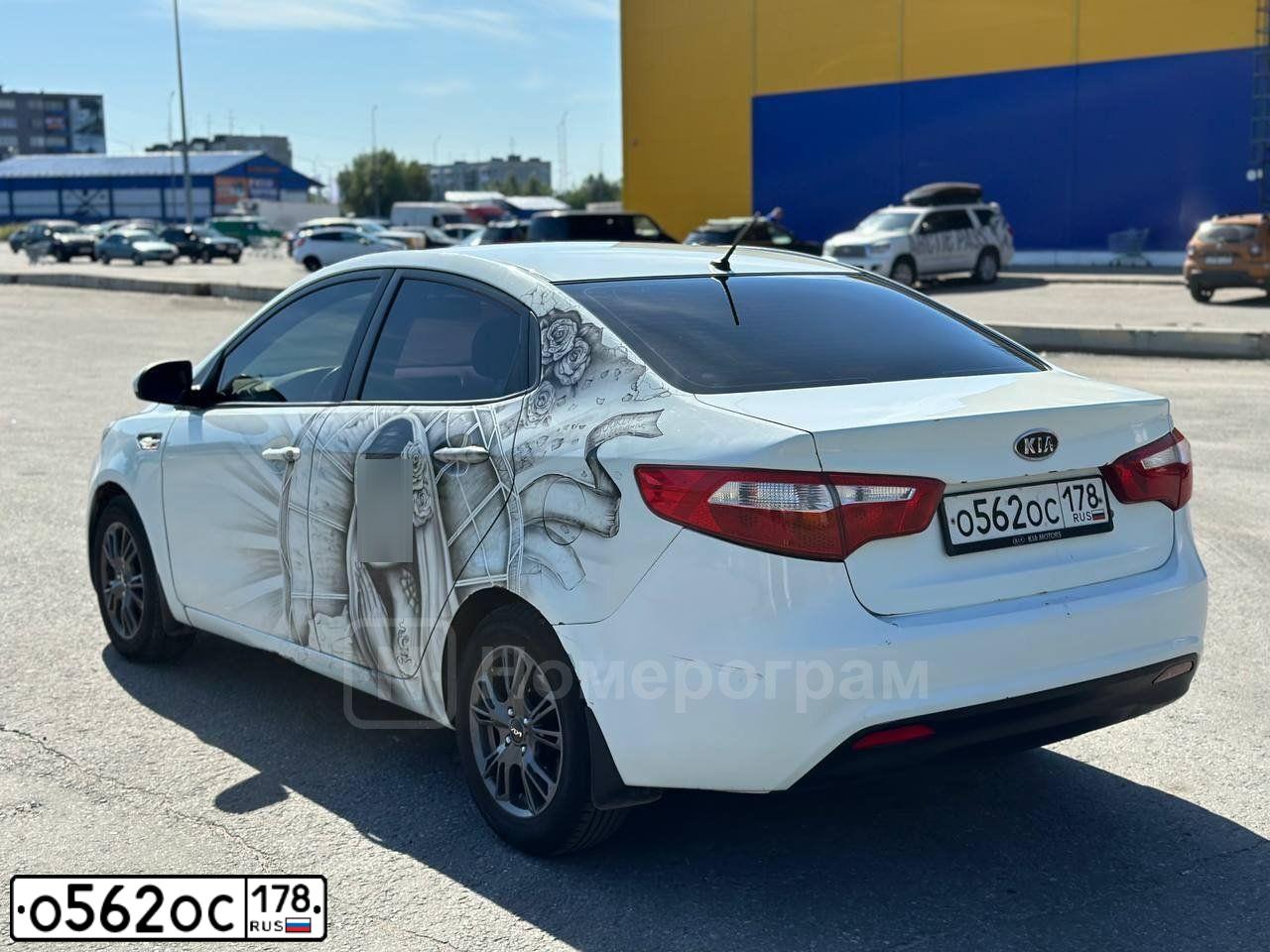 Фото автомобиля KIA RIO, 2011 — госномер В203ОТ51. Цвет: БЕЛЫЙ