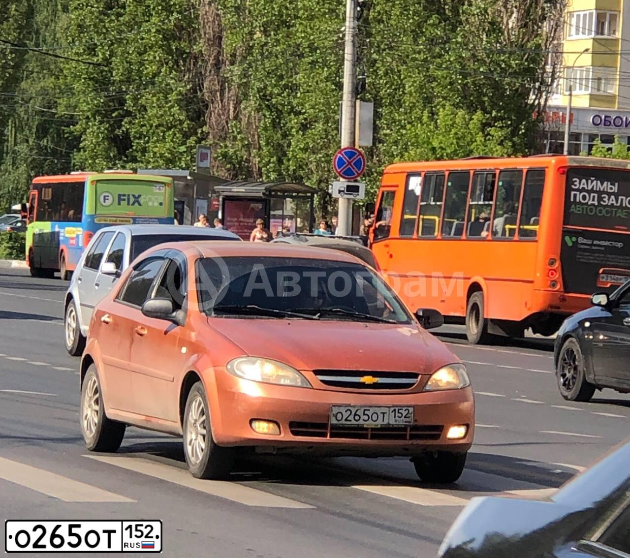 Фото автомобиля CHEVROLET LACETTI, 2007 — госномер О265ОТ152. Цвет: Оранжевый