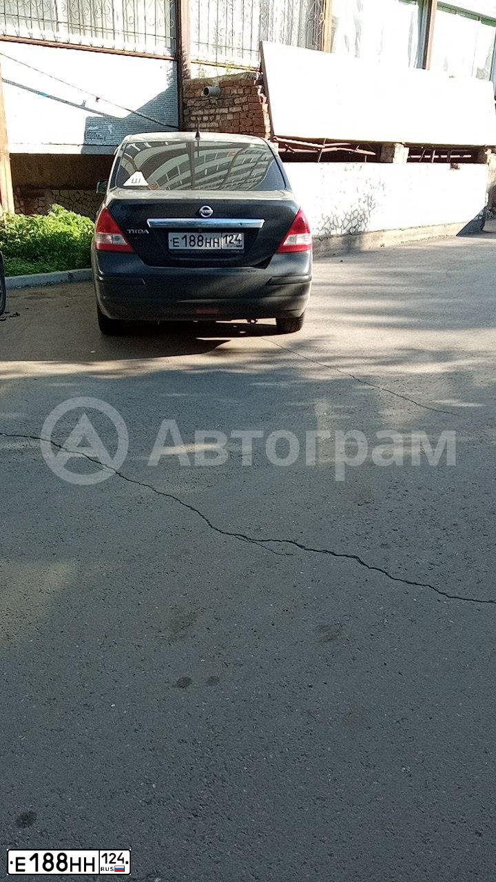 Фото автомобиля NISSAN TIIDA, 2010 — госномер Т223ВМ64. Цвет: ЧЕРНЫЙ