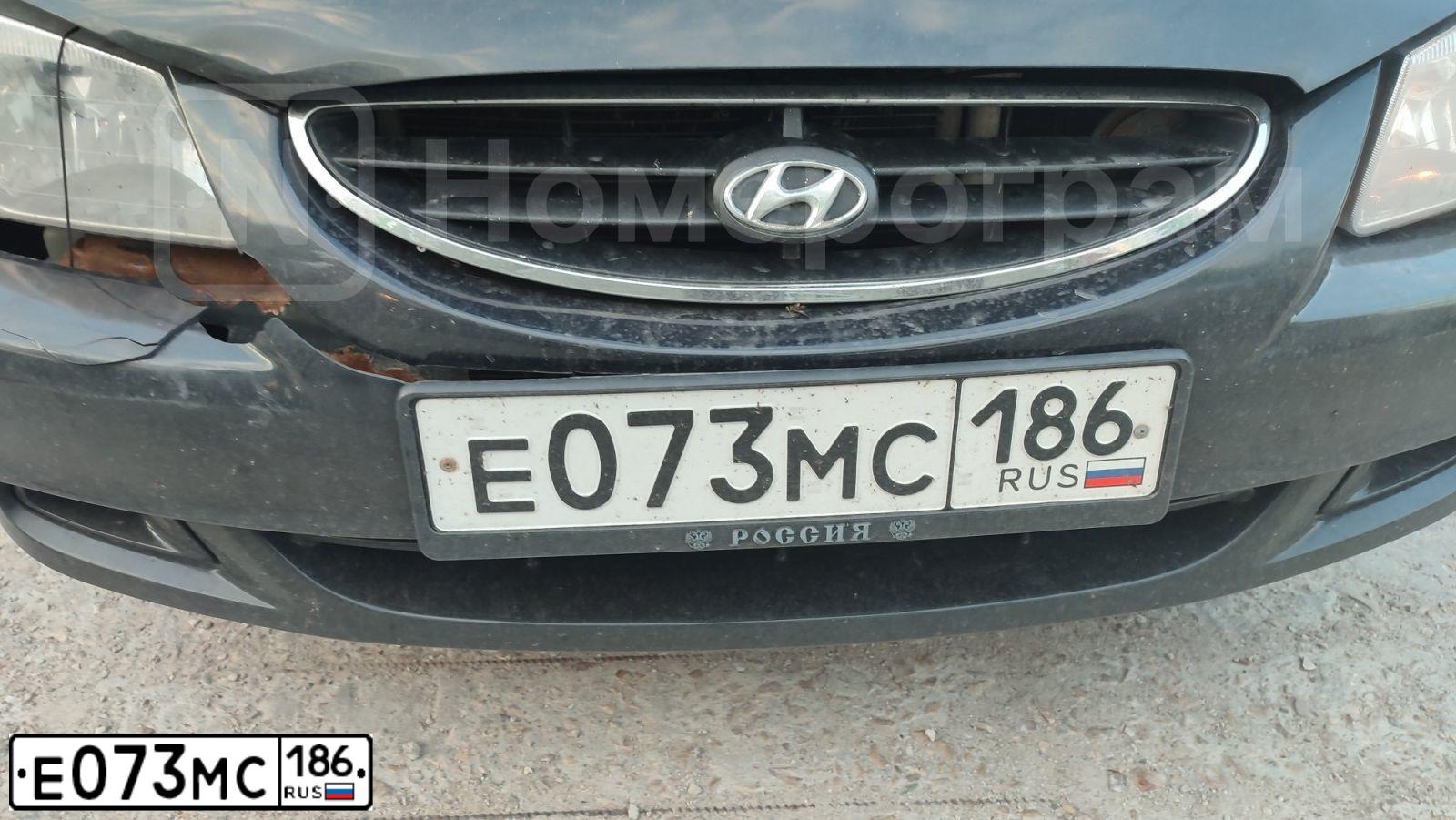Фото автомобиля TAGAZ ACCENT, 2010 — госномер Е073МС186. Цвет: ЧЕРНЫЙ