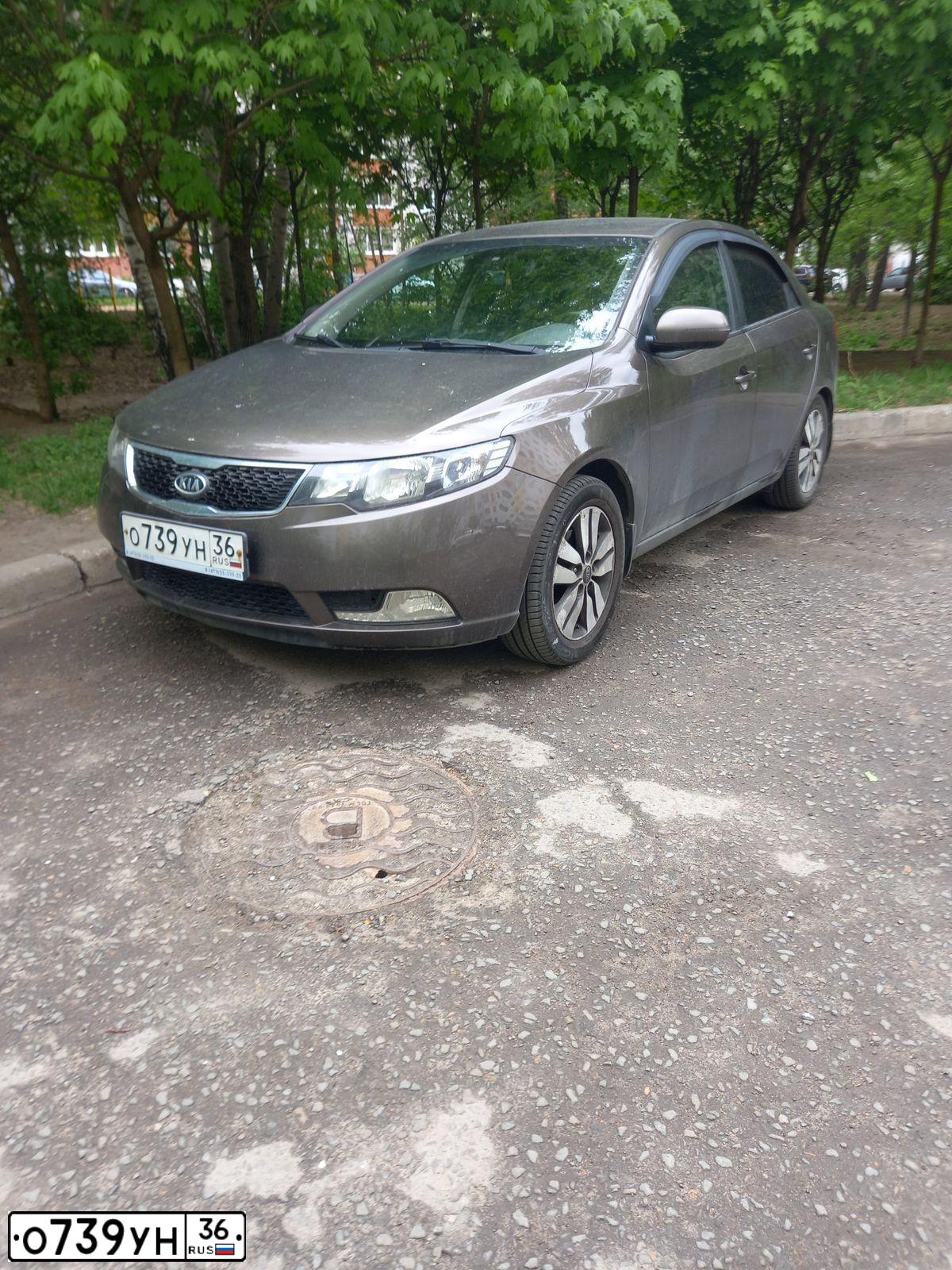 Фото автомобиля KIA CERATO, 2012 — госномер О739УН36. Цвет: БЕЖЕВЫЙ